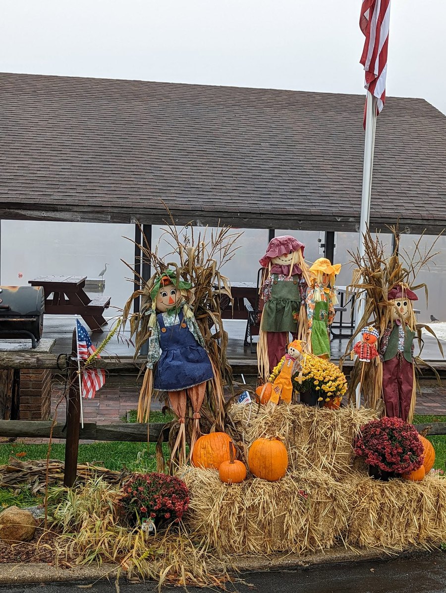 Autumn scarecrow and pumpkin display beside the Sparta Lake pavilion