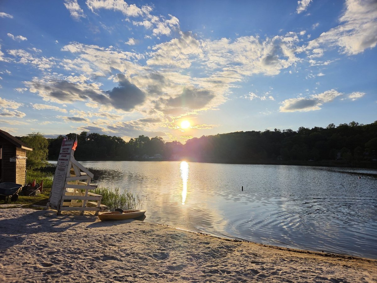 Sunset over the Sparta Lake beach and swimming area